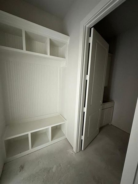 Mudroom with concrete flooring