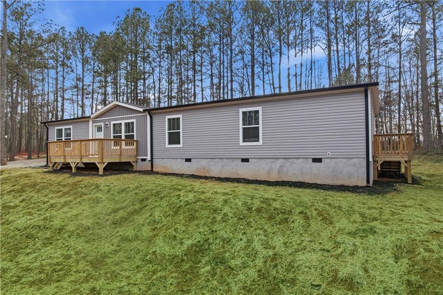 Exterior details and patio area of a home in , Ball Ground (Image 24).