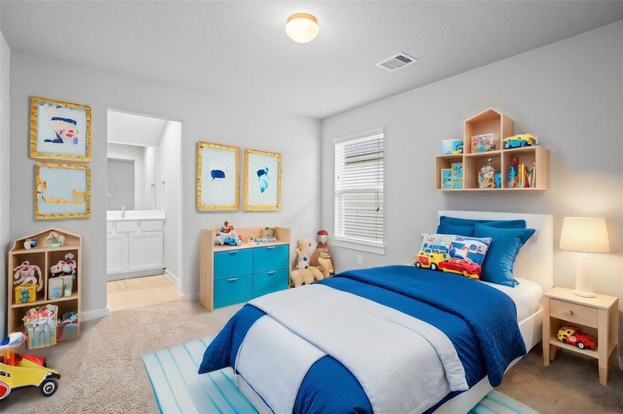 Secondary bedroom features plush carpet, custom paint, high ceilings, and a large window with privacy blinds. This bedroom has a jack and jill bathroom with another secondary bedroom.