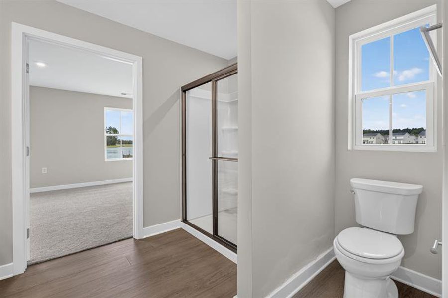 Furnished interior view inside a new home in Beacon Point at New Hampstead, Savannah (Image 14). Furnished interior view inside a new home in Beacon Point at New Hampstead, Savannah (Image 14).