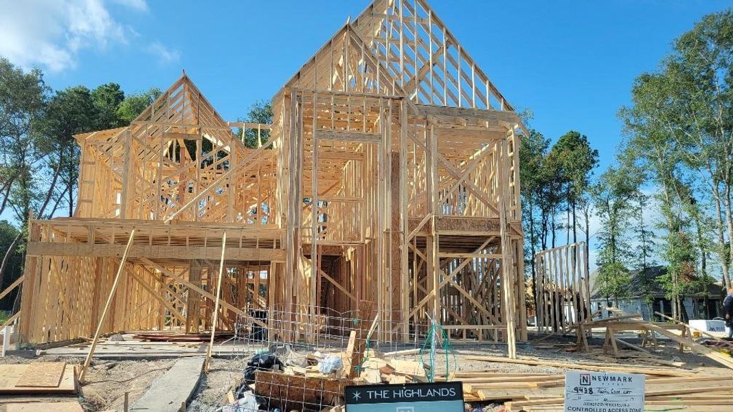 Front exterior of a new home in The Highlands 50', Porter, TX, highlighting curb appeal (Image 2). Front exterior of a new home in The Highlands 50', Porter, TX, highlighting curb appeal (Image 2).