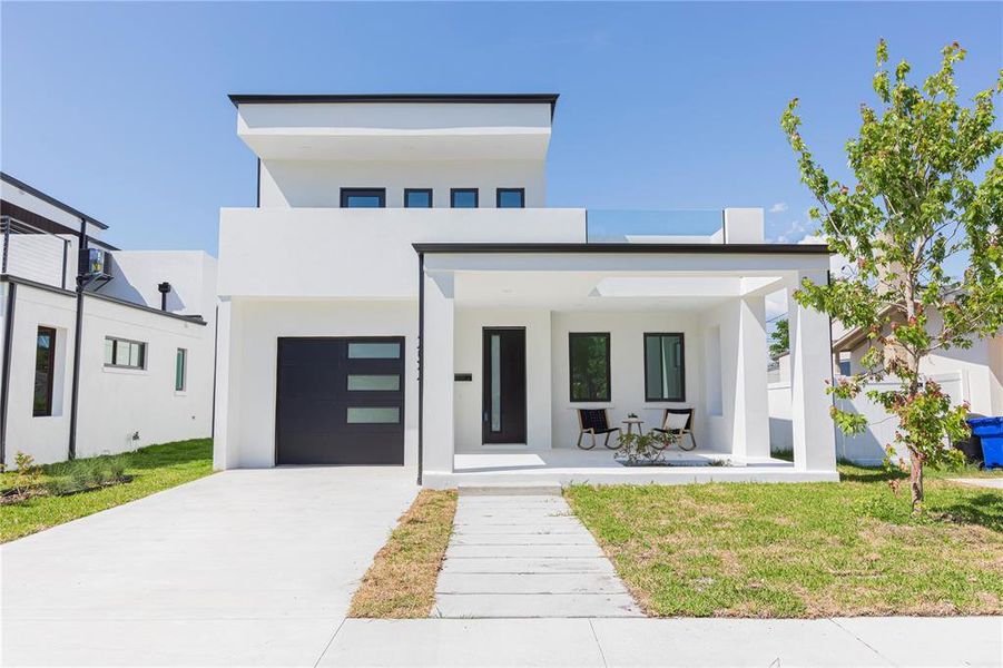 Front exterior of a new home in , St. Petersburg, FL, highlighting curb appeal (Image 26).