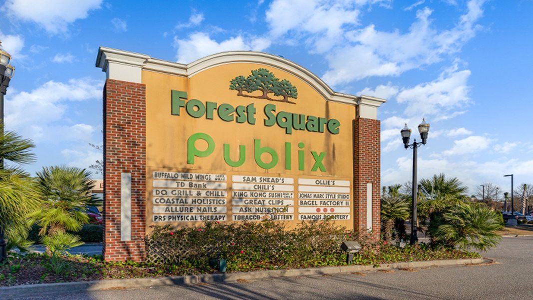 Front exterior of a new home in The Reserve at Wild Horse, Conway, SC, highlighting curb appeal (Image 14).