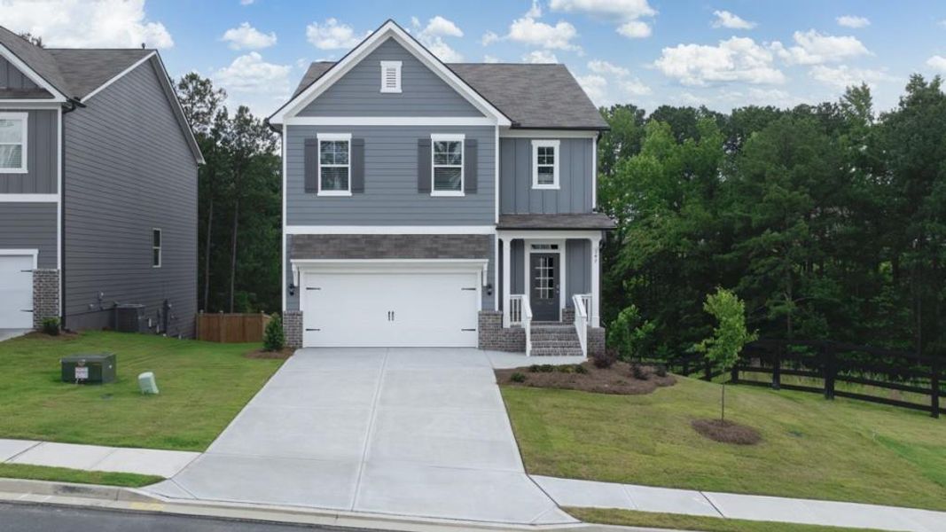 Front exterior of a new home in Lost Creek, Dallas, GA, highlighting curb appeal (Image 1). Front exterior of a new home in Lost Creek, Dallas, GA, highlighting curb appeal (Image 1).