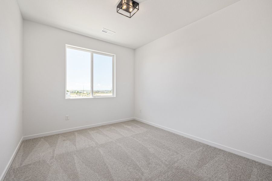 Spacious, unfurnished interior of a new home in Painted Prairie, Aurora (Image 20).