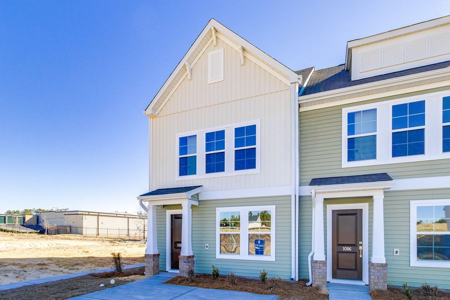 Front exterior of a new home in Astoria, Columbia, SC, highlighting curb appeal (Image 18).