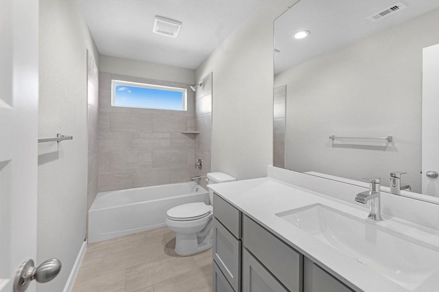 Furnished interior view inside a new home in Sunterra Lakes, Fulshear (Image 6).