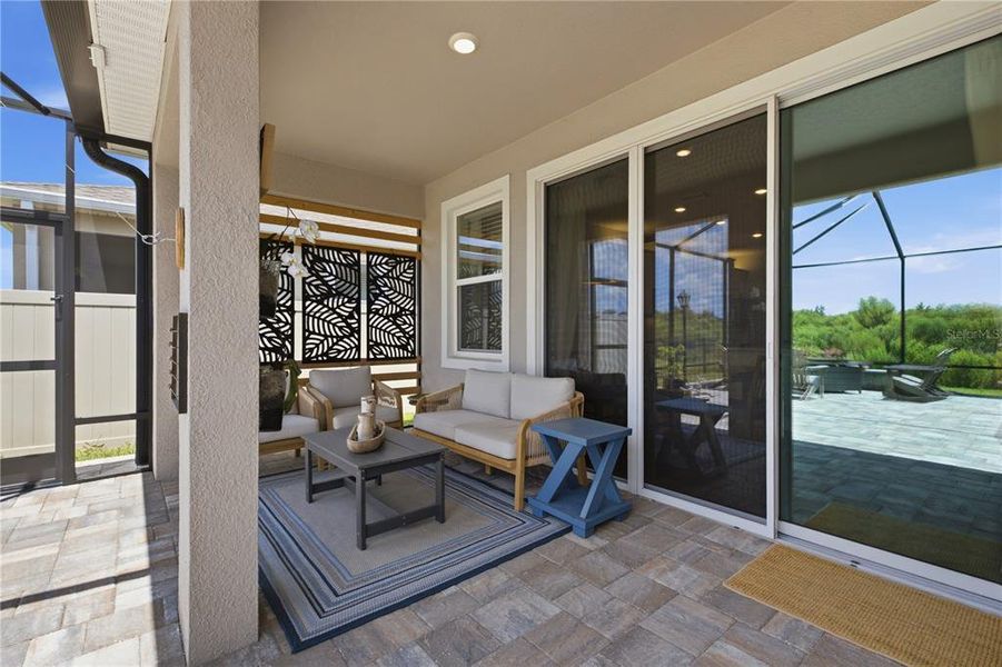Exterior details and patio area of a home in Farm at Varrea, Plant City (Image 28).