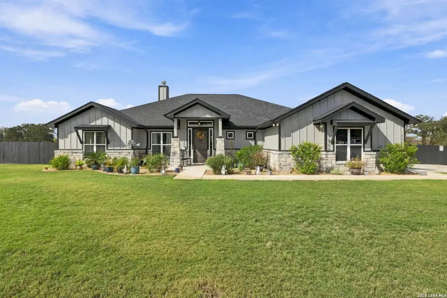 Front exterior of a new home in , La Vernia, TX, highlighting curb appeal (Image 1). Front exterior of a new home in , La Vernia, TX, highlighting curb appeal (Image 1).