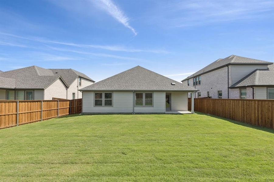 Covered Patio in the Heisman home plan by Trophy Signature Homes – REPRESENTATIVE PHOTO