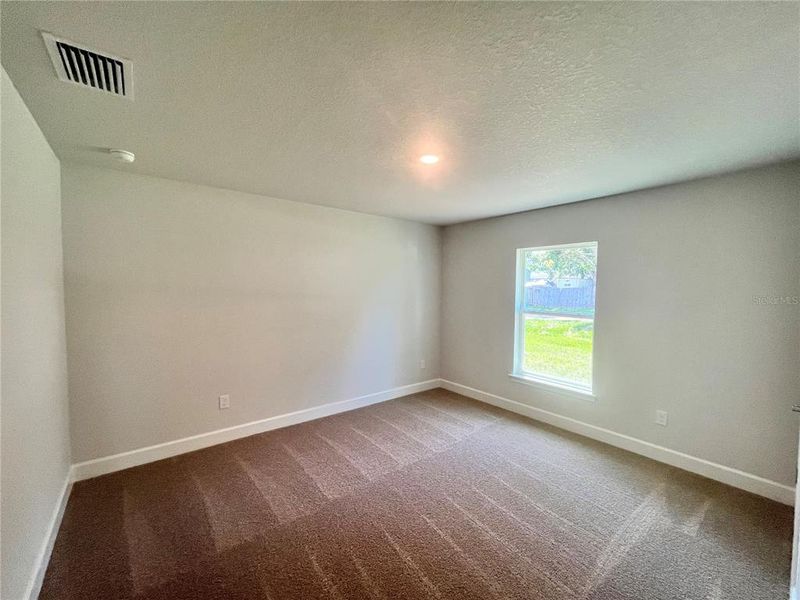 Spacious, unfurnished interior of a new home in Orange Blossom Hills, Summerfield (Image 10).