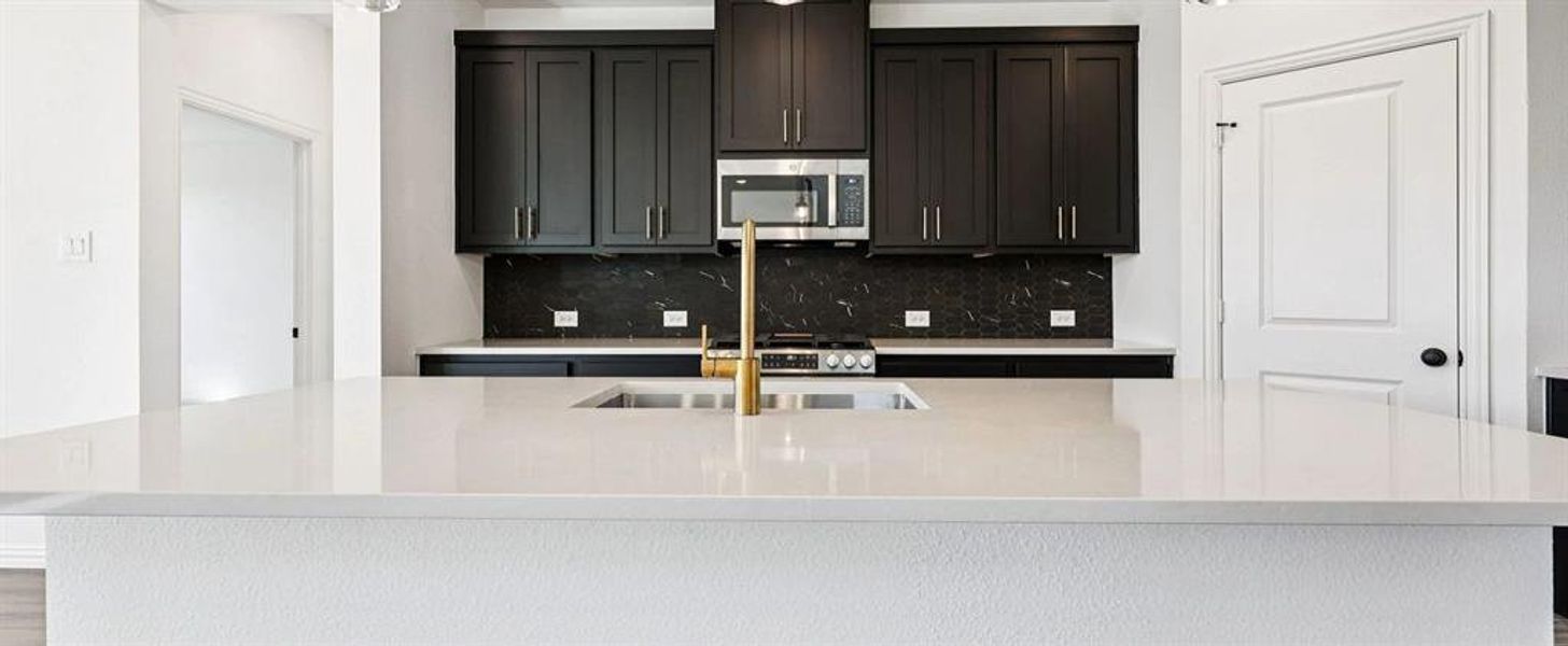 Kitchen featuring the Noir Collection