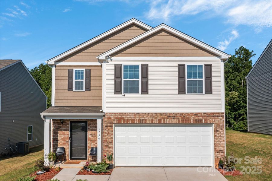 Front exterior of a new home in Mills at Long Creek, Dallas, NC, highlighting curb appeal (Image 2).