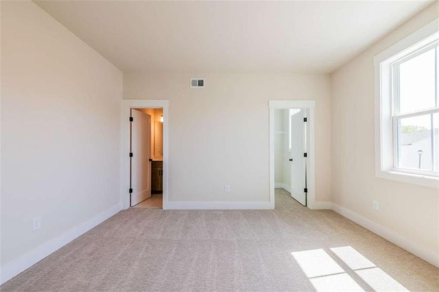 Spacious, unfurnished interior of a new home in The Paddocks at Doc Hughes, Buford (Image 24).