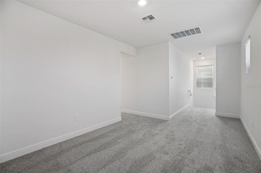 Spacious, unfurnished interior of a new home in Cyrene at Minneola - Villas, Minneola (Image 21).