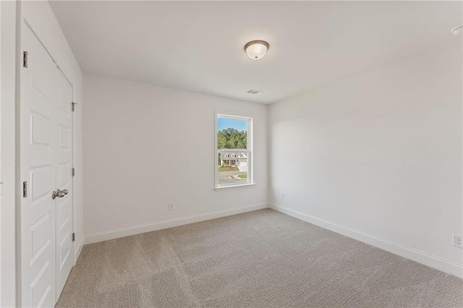 Spacious, unfurnished interior of a new home in Clark Farms, Flowery Branch (Image 13).