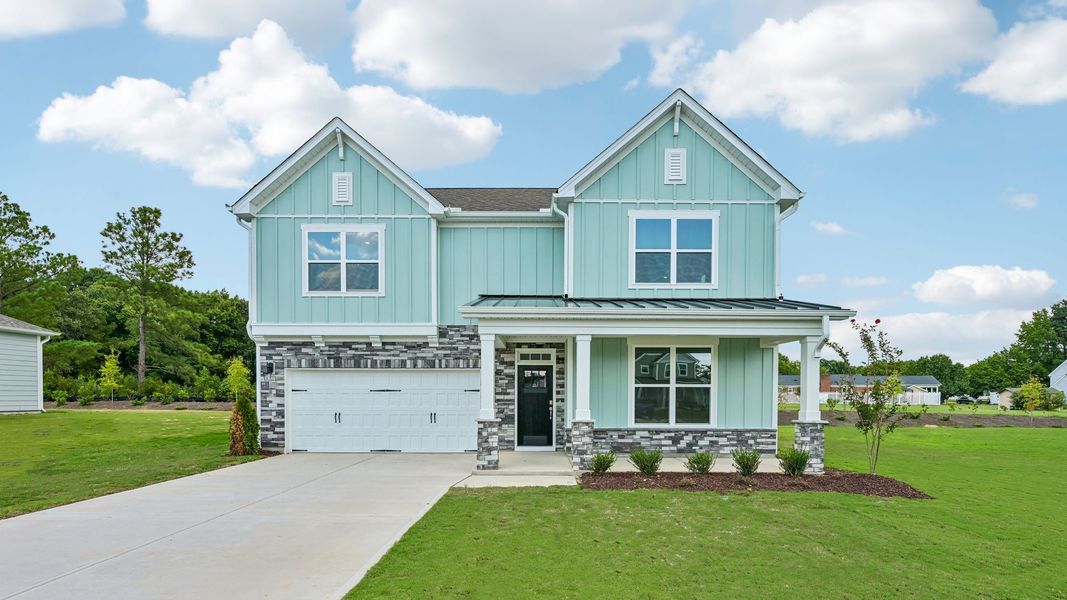 Representative exterior photo of a completed home built from the Lawson by D.R. Horton in Eagle Creek, Fuquay Varina, NC (Image 18).