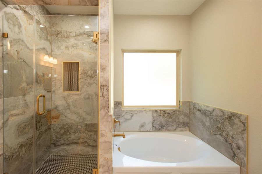 Bathroom with shower with separate bathtub