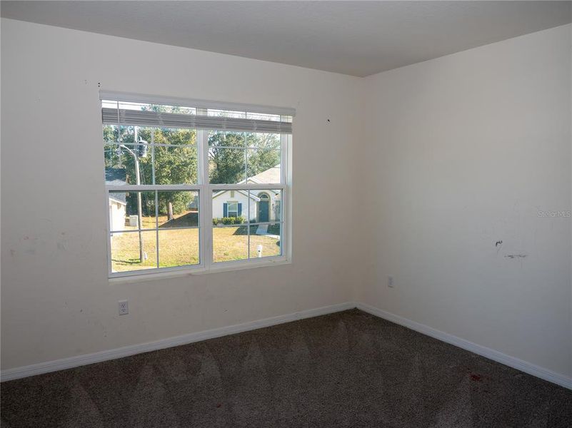 Spacious, unfurnished interior of a new home in Poinciana Enclave, Kissimmee (Image 13).