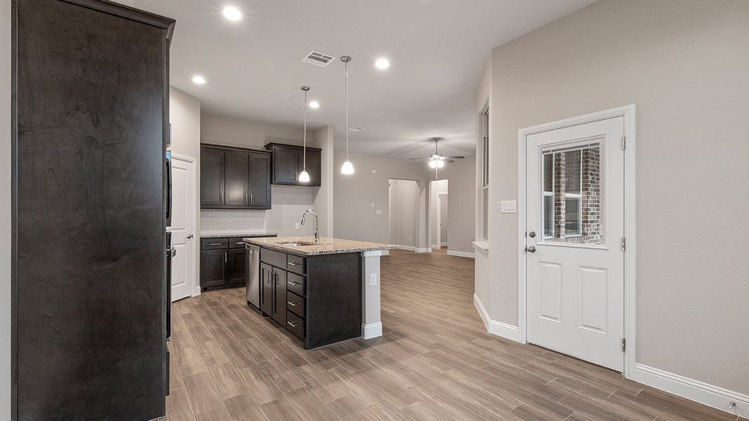 Representative furnished interior of a home built from the Odessa by D.R. Horton in Lakeview Pointe, Grand Prairie (Image 10).