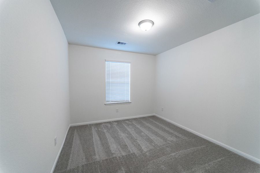 Spacious, unfurnished interior of a new home in Windrose Green, Angleton (Image 27).