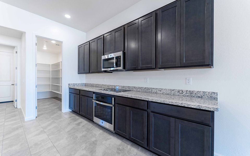 Furnished interior view inside a new home in Heritage Pointe, Chino Valley (Image 6).