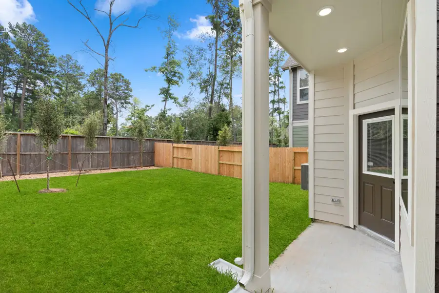 Exterior details and patio area of a home in The Woodlands Hills, Willis (Image 4). Exterior details and patio area of a home in The Woodlands Hills, Willis (Image 4).
