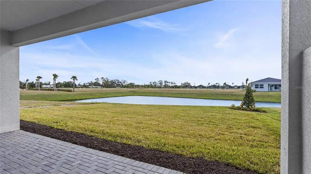 Exterior details and patio area of a home in Woodland Preserve, Parrish (Image 3).