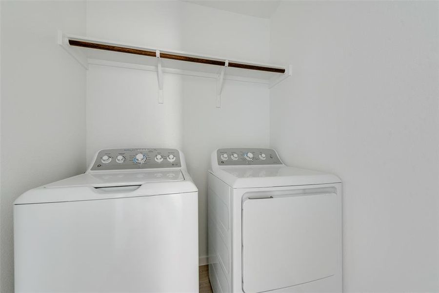 Laundry area with separate washer and dryer