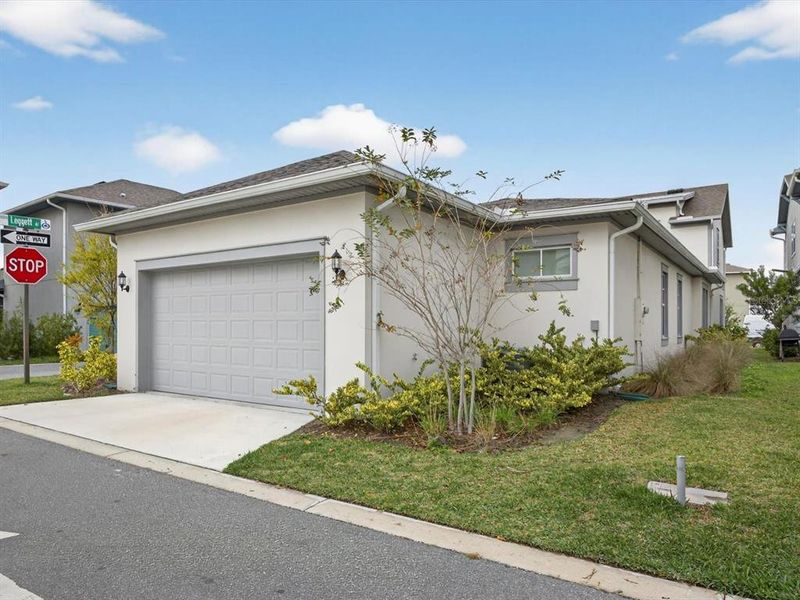 Front exterior of a new home in , Orlando, FL, highlighting curb appeal (Image 23). Front exterior of a new home in , Orlando, FL, highlighting curb appeal (Image 23).