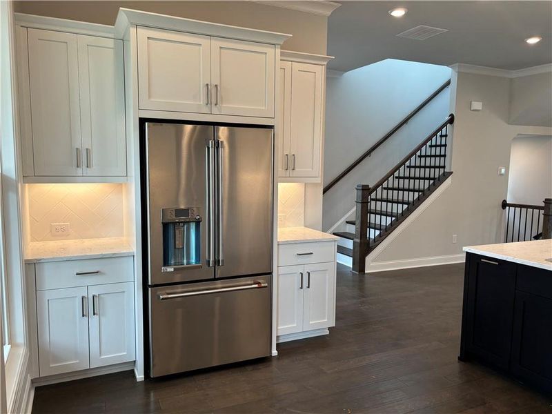 Furnished interior view inside a new home in Brackley Single Family, Cumming (Image 10).