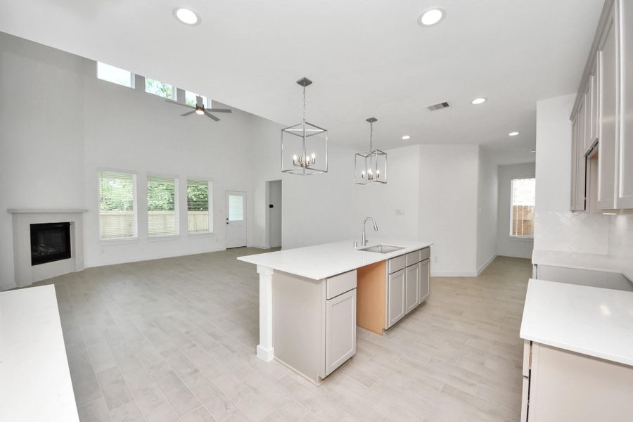 This generously spacious kitchen is a dream realized! Sample photo of completed home with similar floor plan. Actual colors and selections may vary.