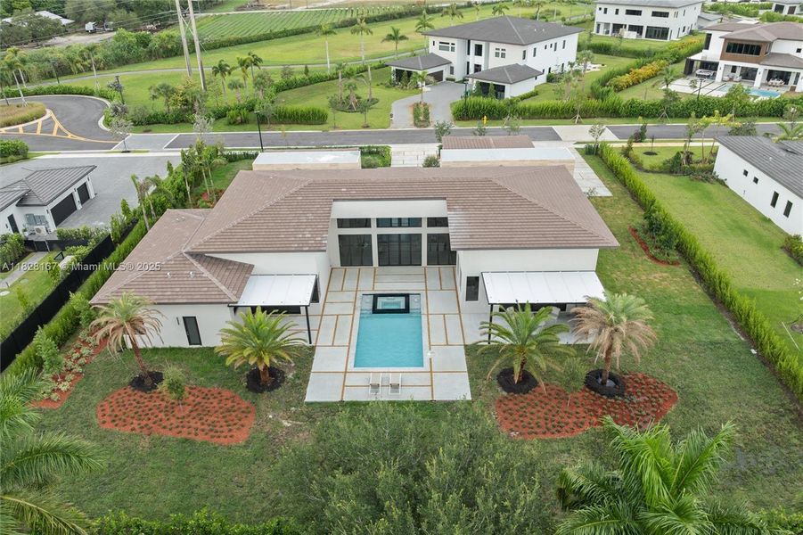 Front exterior of a new home in , Davie, FL, highlighting curb appeal (Image 24).