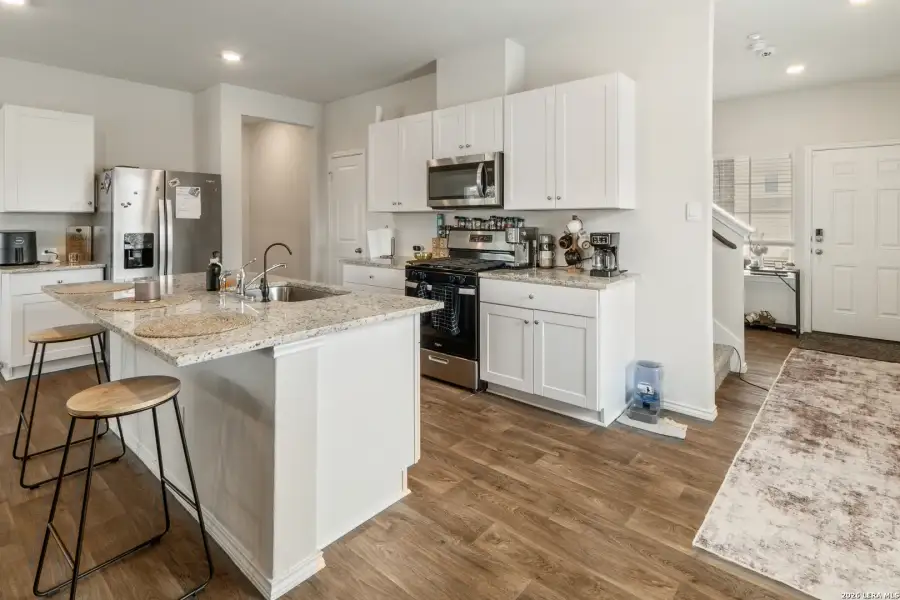 Furnished interior view inside a new home in Avenida, Converse (Image 11).