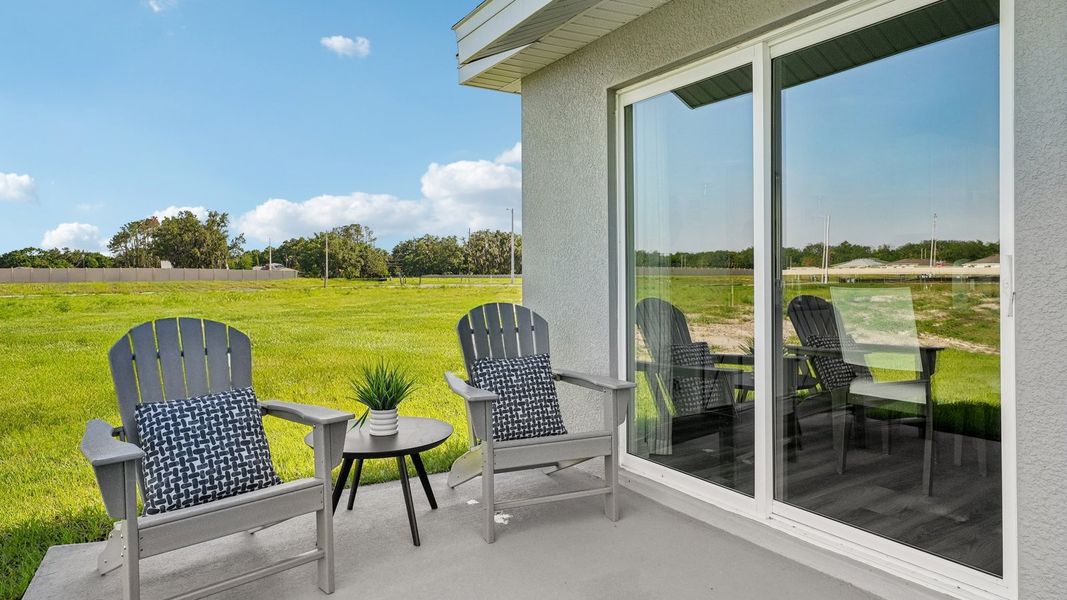 Exterior details and patio area of a home in Oakfield Lakes, Parrish (Image 3). Exterior details and patio area of a home in Oakfield Lakes, Parrish (Image 3).