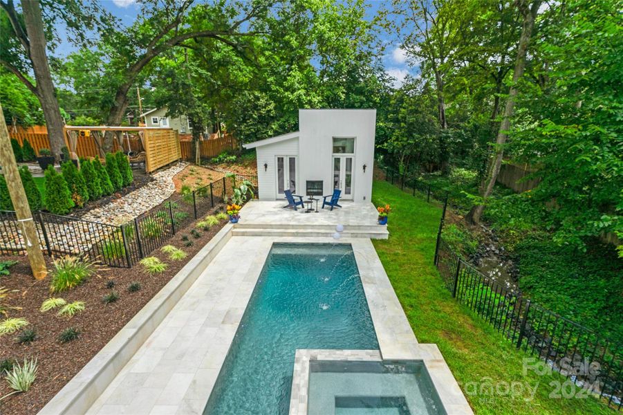 Overlooking pool and pool house