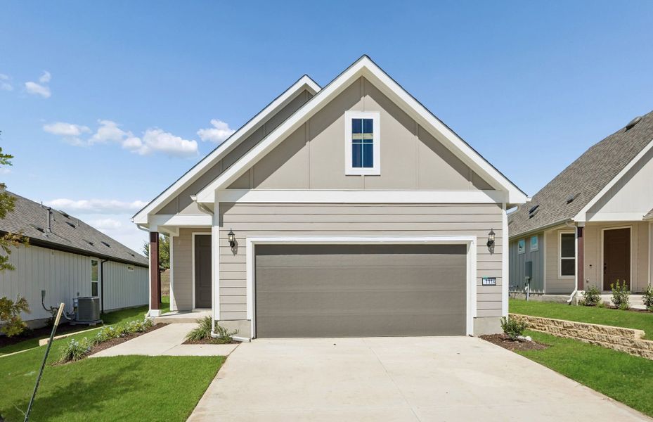 Front exterior of a new home in Sun City Texas, Georgetown, TX, highlighting curb appeal (Image 18).
