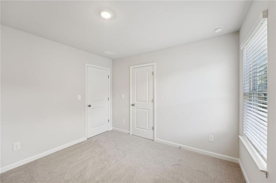 Spacious, unfurnished interior of a new home in Westmont Preserve, Powder Springs (Image 42).