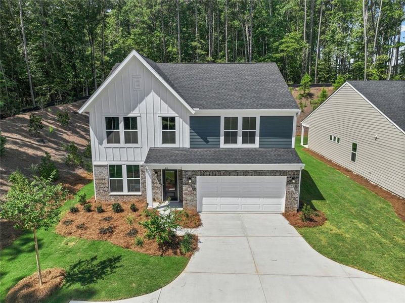 Front exterior of a new home in Easton Park, Dallas, GA, highlighting curb appeal (Image 22). Front exterior of a new home in Easton Park, Dallas, GA, highlighting curb appeal (Image 22).