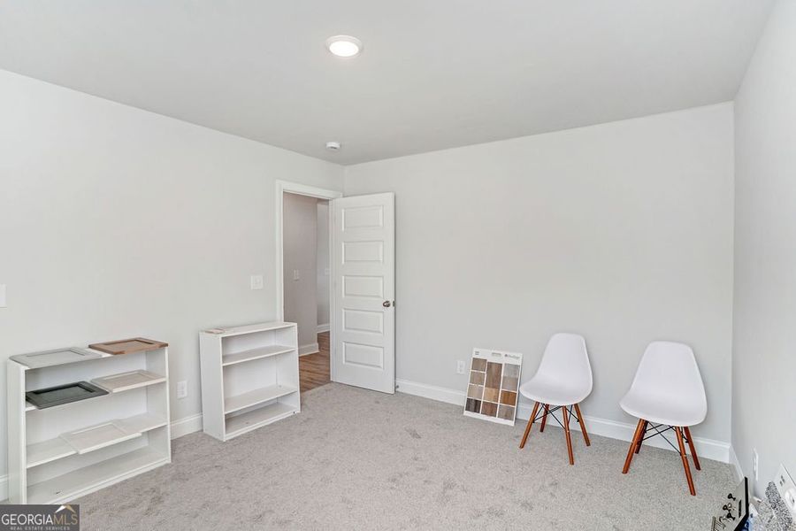 Furnished interior view inside a new home in Harley Farms South, Bonaire (Image 15).