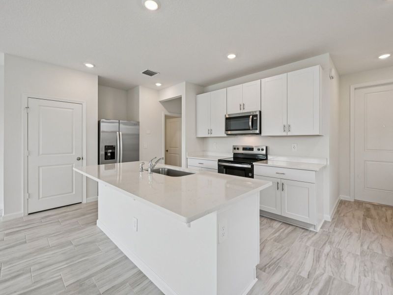 Furnished interior view inside a new home in Tidewater, Fort Pierce (Image 5).