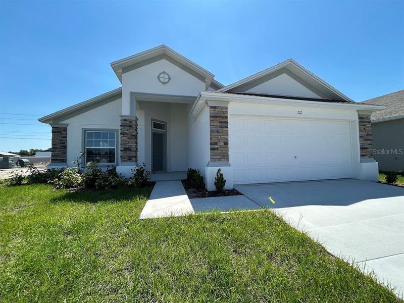 Front exterior of a home in the Thompson Preserve community, located in Bartow, FL (Image 2).