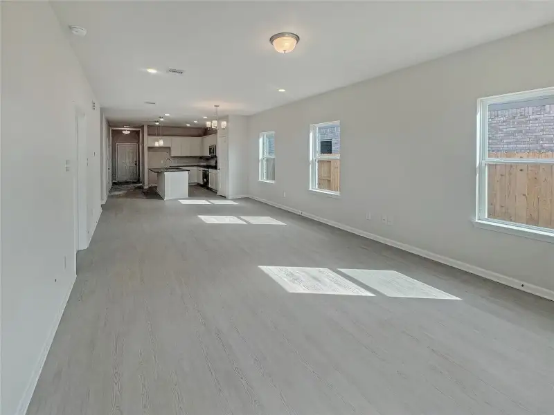 The Piedmont- Family Room into the Dining Area and Kitchen.