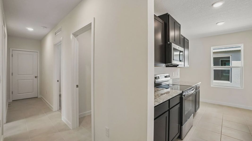 Furnished interior view inside a new home in Willowbrook North, Winter Haven (Image 29).
