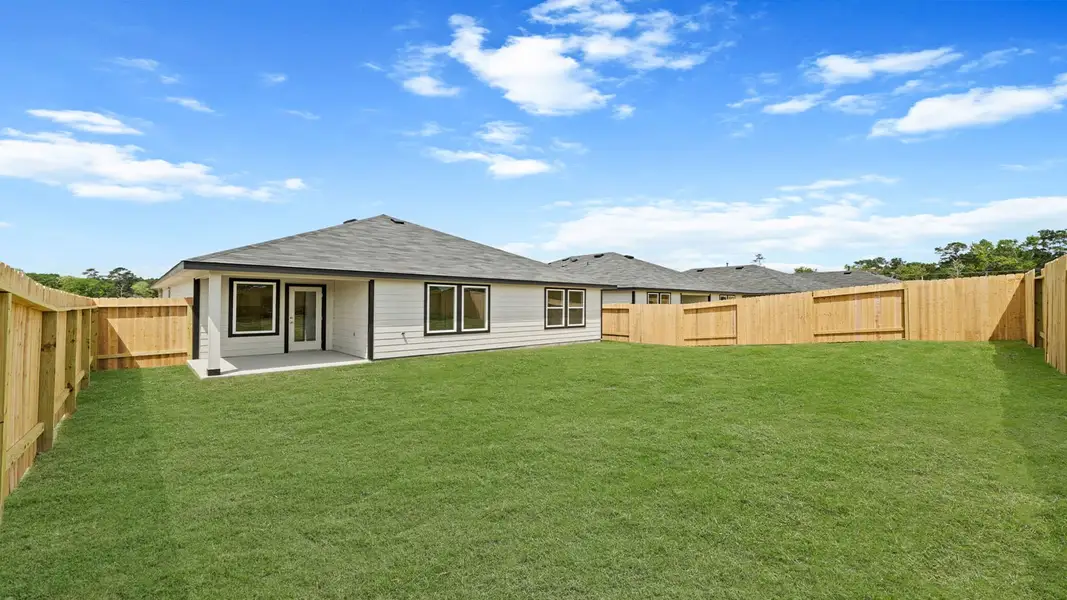 Exterior details and patio area of a home in Chapel Lakes, Montgomery (Image 4).