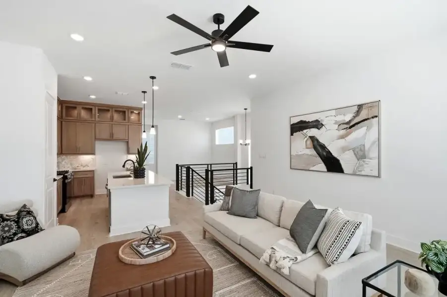 Representative furnished interior of a home built from the Calypso by Chesmar Homes in Centero at Stone Oak, San Antonio (Image 15).