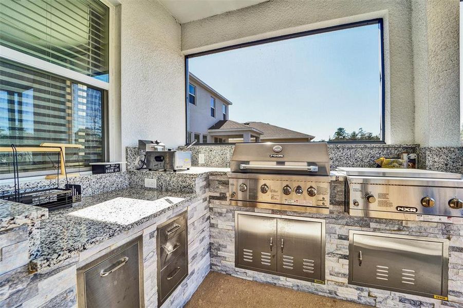 Exterior details and patio area of a home in Waterford, Brooksville (Image 25).