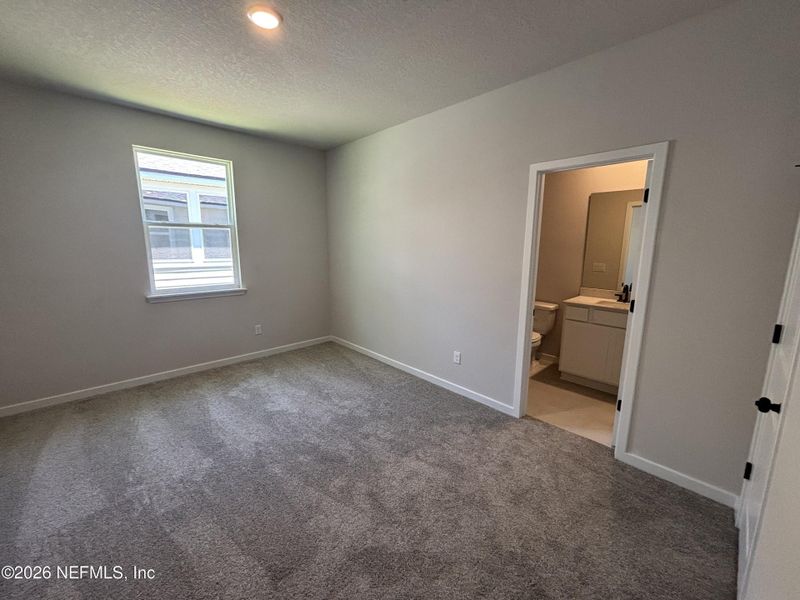 Spacious, unfurnished interior of a new home in Reserve East, Flagler Beach (Image 46).