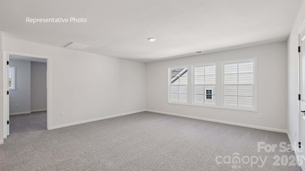 Spacious, unfurnished interior of a new home in Sanctuary at Southgate, Indian Trail (Image 27).