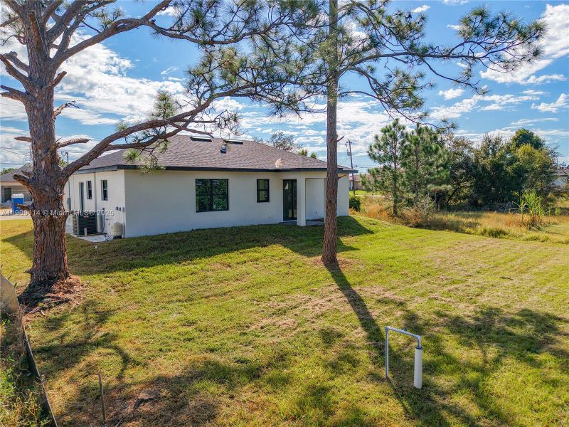 Exterior details and patio area of a home in , Lehigh Acres (Image 25).